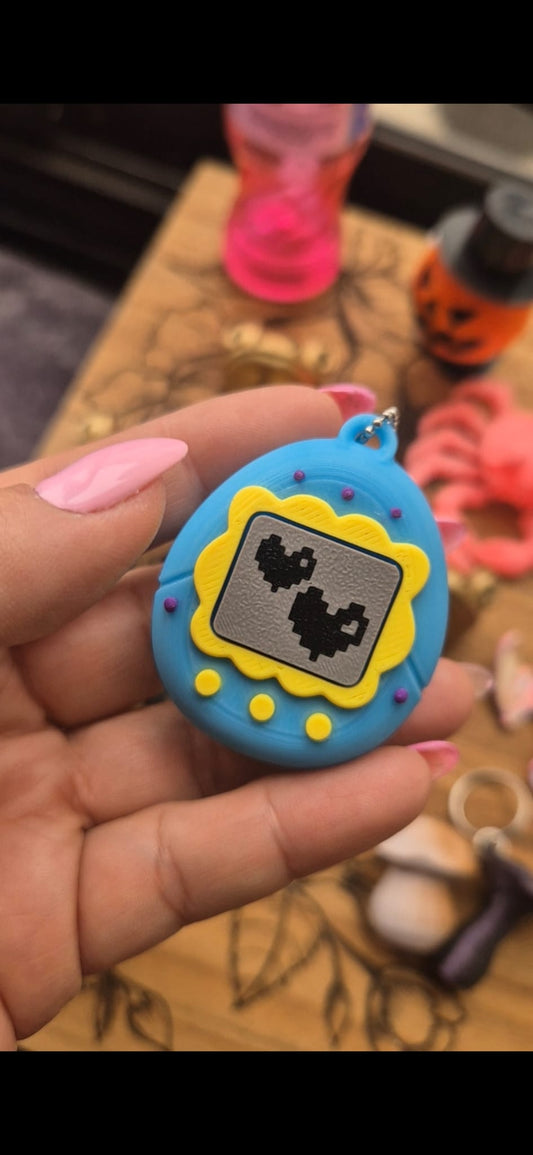 Llavero fidget retro Tamagotchi Clicker